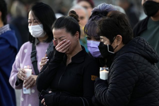 Photo: People attending a vigil outside Monterey Park City Hall, blocks from the Star Ballroom Dance Studio on Tuesday, Jan. 24, 2023, in Monterey Park, Calif. A group of Asian women are seen mourning and crying at a vigil. At front, one Asian woman covers her face as she cries, as two masked women comfort her on either side.