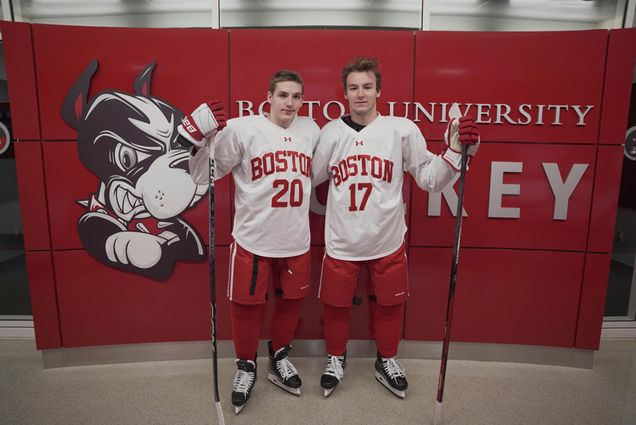 Freshmen Lane (CAS’26) and Quinn Hutson (CAS’26), pictured here in full hockey uniforms, are tied in scoring the second most goals for the Terriers this season, with nine each. Growing up playing against each other, the brothers are enjoying their time skating together for the No. 4/5 Terriers. [Credit: Matt Woolverton]