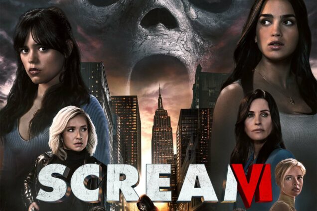 Photo: Movie poster for Scream VI movie. Various cast members looking in different directions in a V formation. Ghost face is in the middle/sky background. A cityscape is in the background, behind the test reading "Scream VI".