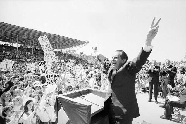 Photo: In this Sept. 19, 1968, file photo, then-presidential candidate Richard Nixon, a white man wearing a suit and tie, flashes the victory sign as he acknowledges cheers from the crowd, at the fairgrounds of Springfield, Mo. There’s little doubt Nixon was up to dirty tricks before his presidency ever began. Documents released by the Nixon Presidential Library add weight to existing evidence that his 1968 presidential campaign tried to sabotage Vietnam peace talks before the U.S. election. (AP Photo/File)