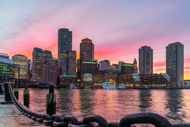 Photo: Boston skyline and Fort Point Channel at sunset as viewed fantastic twilight or dusk time from Fan Pier Park in Boston, Massachusetts, USA.