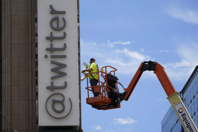 Photo: A workman removes a character from a sign on the Twitter headquarters building in San Francisco, Monday, July 24, 2023. Elon Musk has unveiled a new "X" logo to replace Twitter's famous blue bird as he follows through with a major rebranding of the social media platform he bought for $44 billion last year. The X started appearing at the top of the desktop version of Twitter on Monday, but the bird was still dominant across the smartphone app. (AP Photo/Godofredo A. Vásquez)