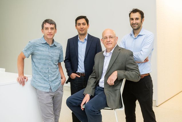 Photo: Group photo of the 2023 Kilachand Fund Award winners. Posing from left to right are: Brian Clearly, Hadi Nia, Jospeh Mizgerd, and Michael Economo. Four men smile and pose together in a brightly lit room.