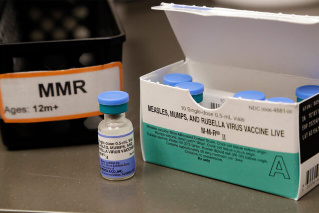Photo: A small vial containing MMR vaccine for Mumps, Measles, and Rubella