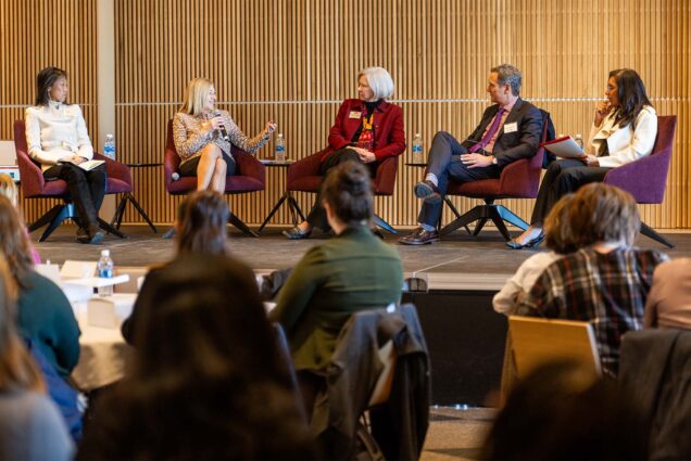 Photo: A panel of experts debate gender pay equity at a recent conference at Boston University