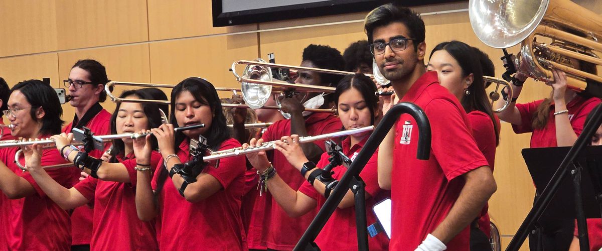 BU pep band playing at 2024 IEW event