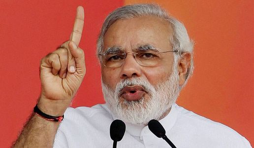 New Delhi: BJP Prime Ministerial candidate Narendra Modi speaks at party Vikas Rally in New Delhi on Sunday.PTI Photo by Manvender Vashist(PTI9_29_2013_000141B)