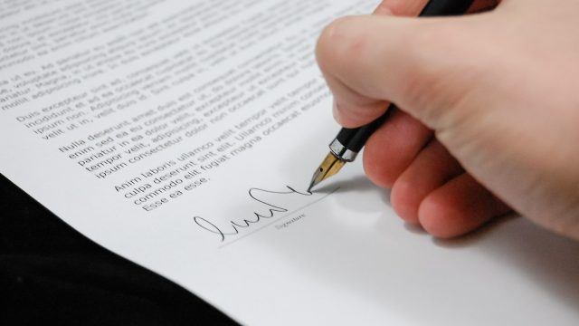 Hand signing document