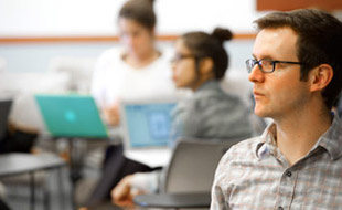 callout-wide-male-student Photo of male student in classroom