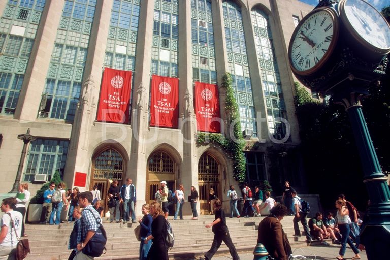 students walk in front of Tsai perf. center