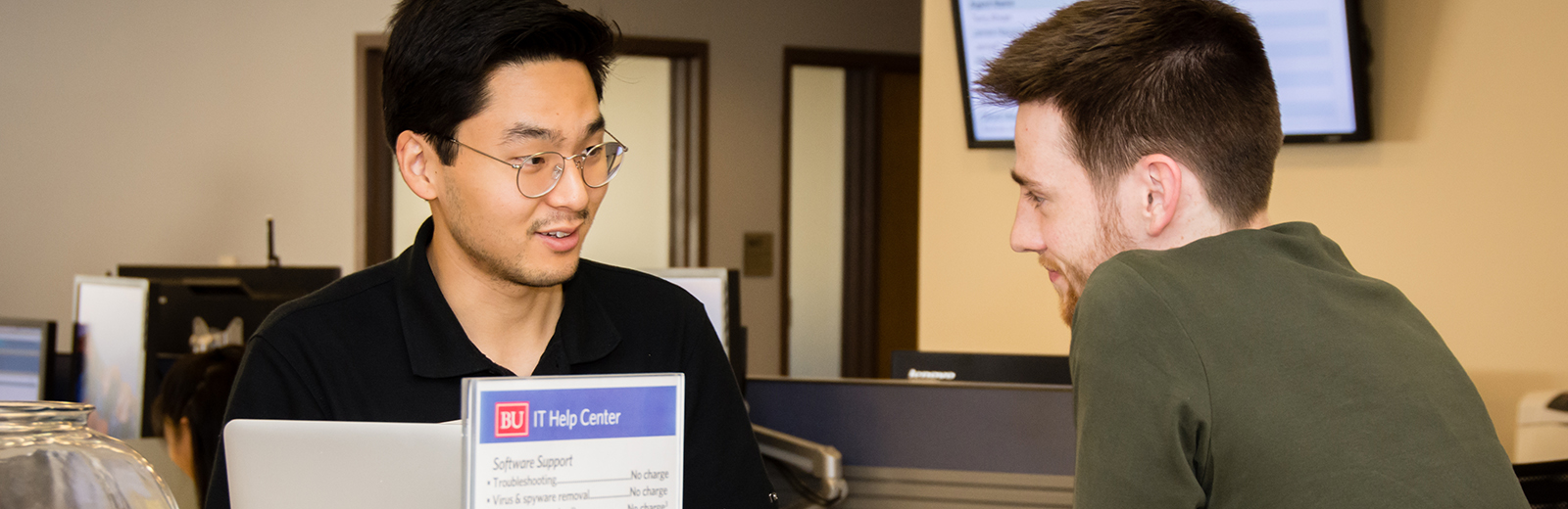 Student receiving help at the IT Help Center