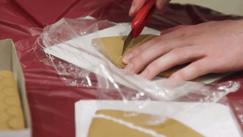 animated gif of cutting the gingerbread house roofs