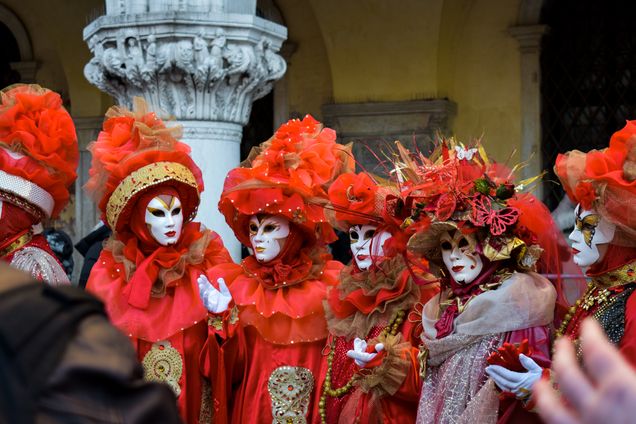 masked people in san marcos square venice