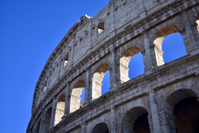 partial view of the outside of the collosseum rome