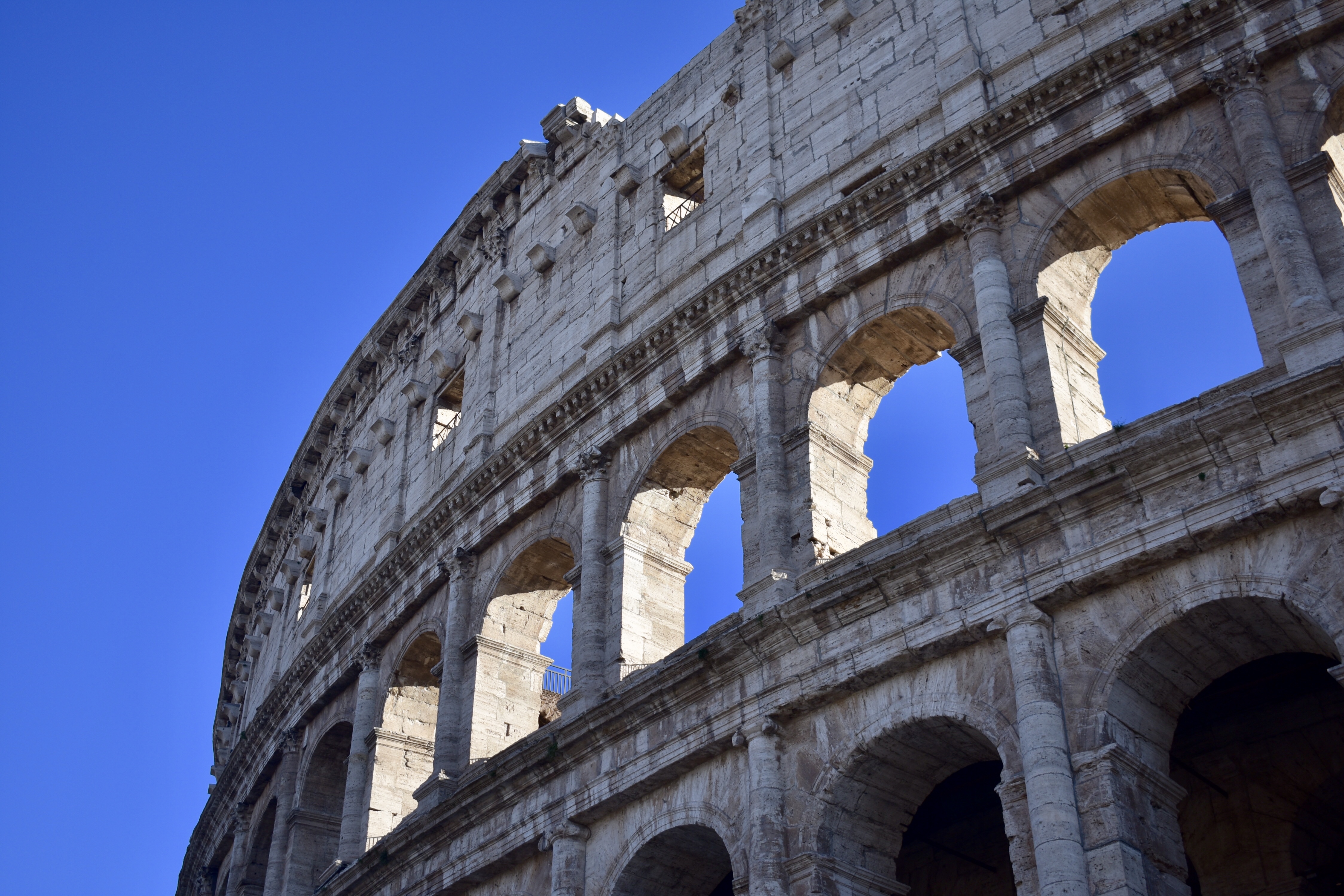 partial view of the outside of the collosseum rome