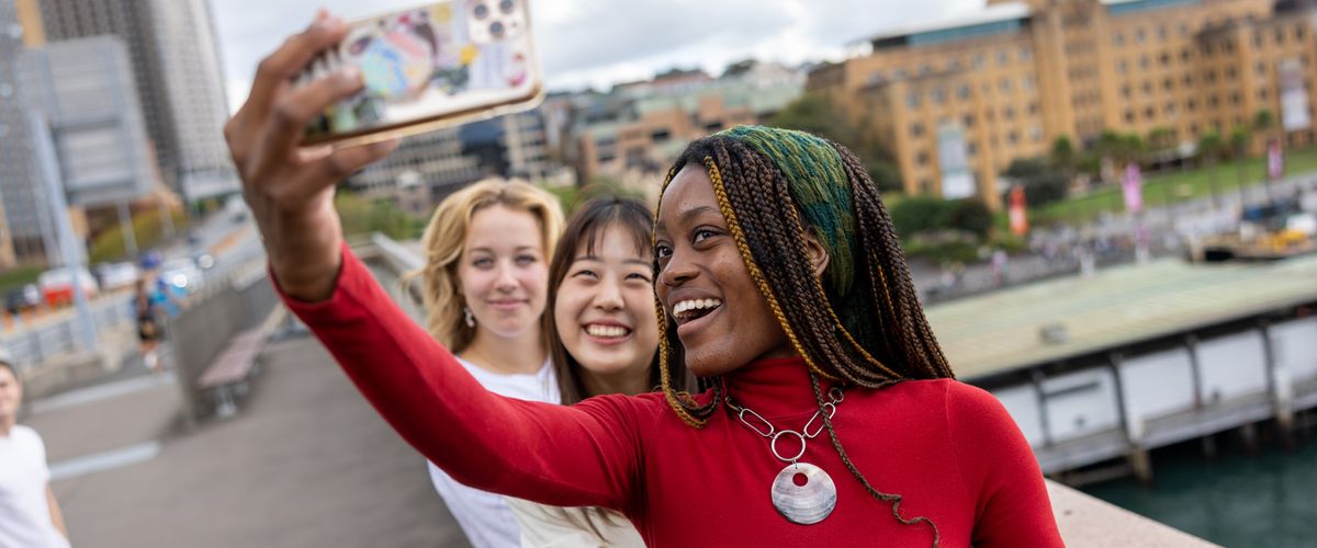 Students taking selfies