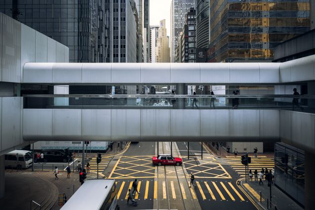 Bridge between buildings over a street in Hong Kong