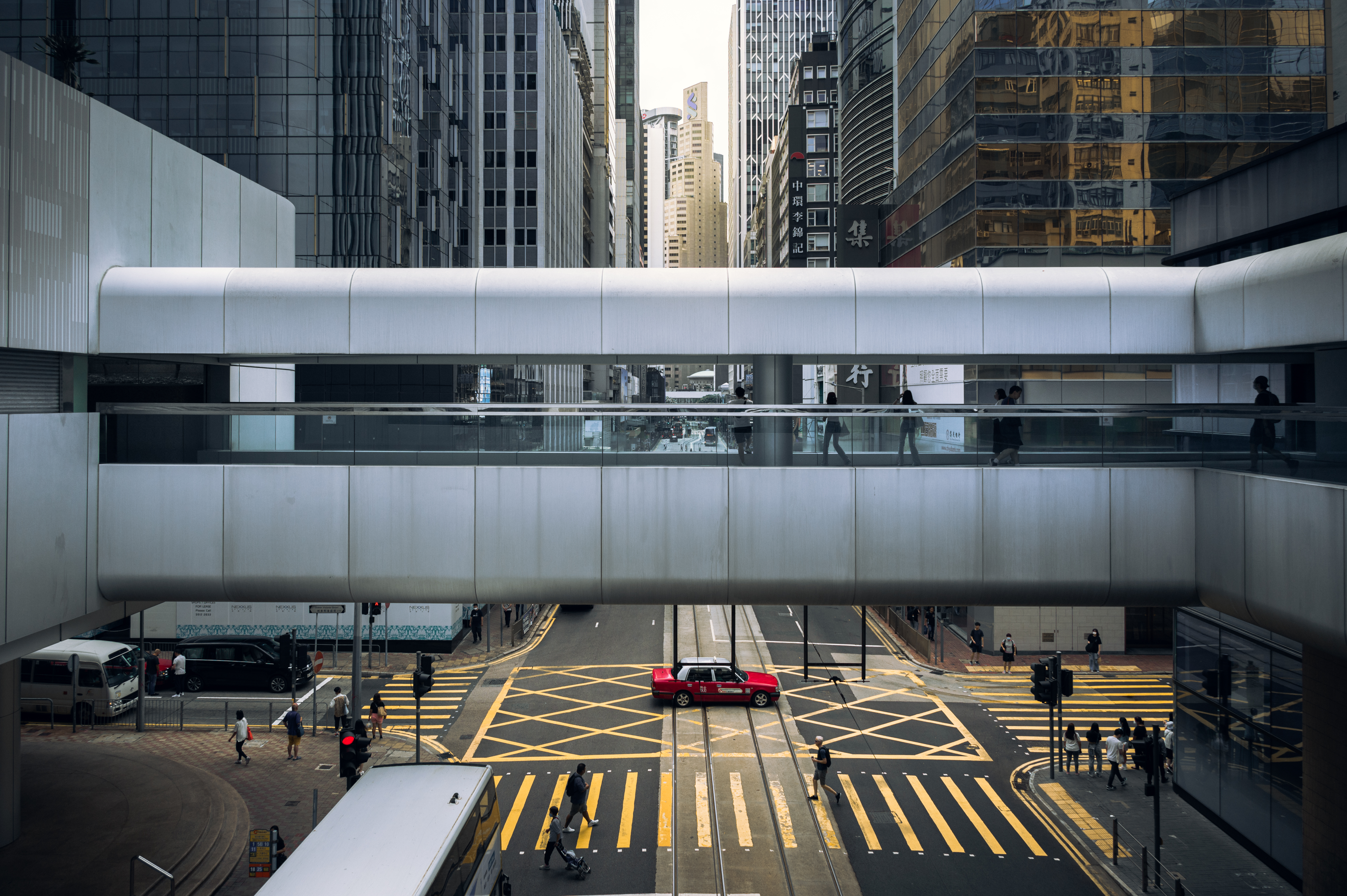 Bridge between buildings over a street in Hong Kong