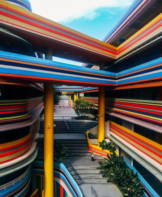 Building with continous clorful balconies and pillars in Singapore