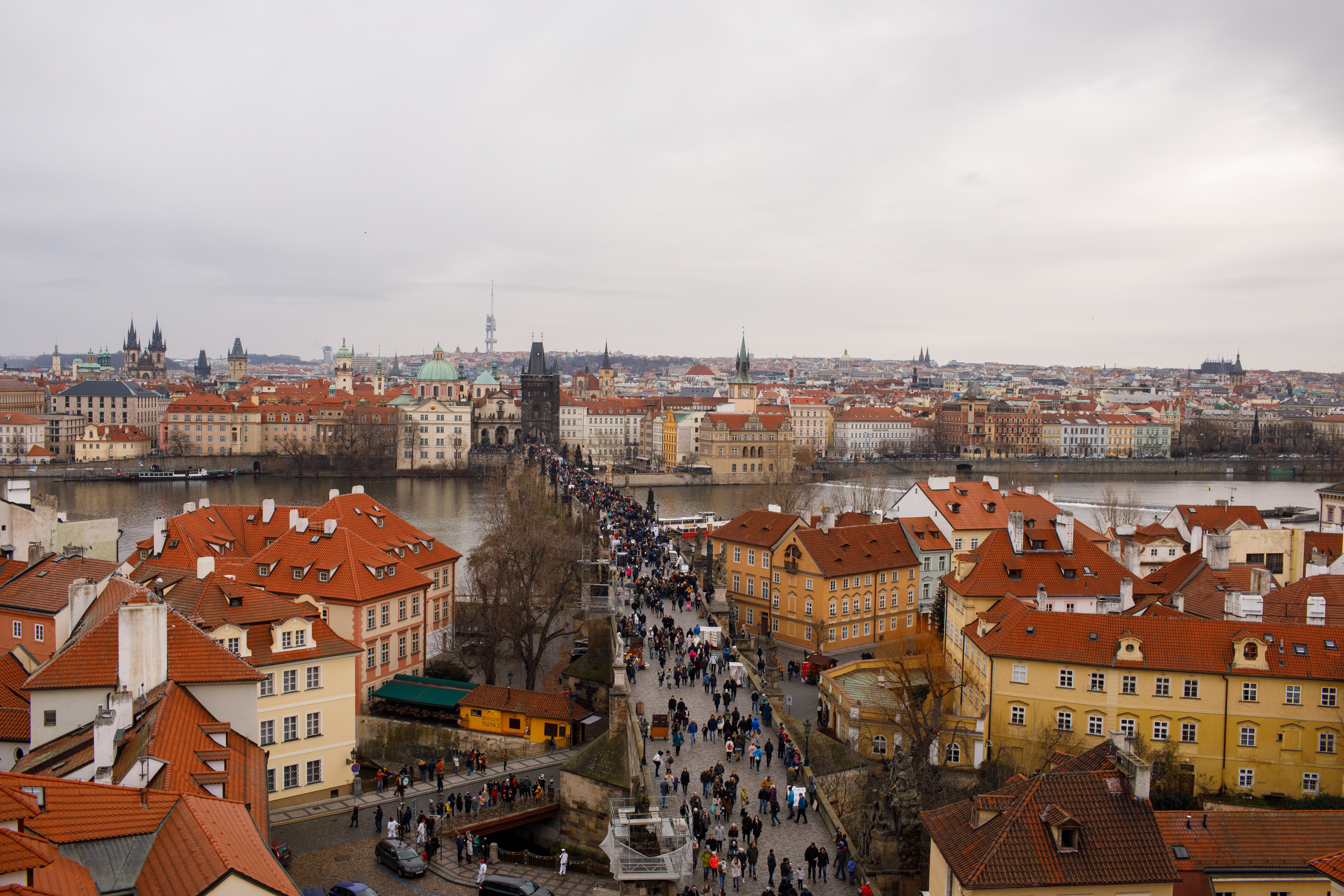Image of prague old town people walking over bridge