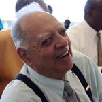 Professor Emeritus James Teele enjoys hearing alumni memories of the African American Studies Program