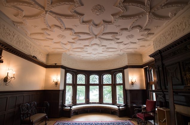 The restoration of the Library highlights the room's elaborate plasterwork and meticulously crafted windows.