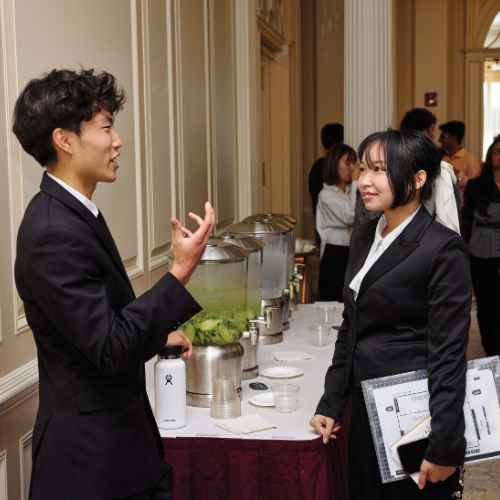 BU students connecting at a career fair