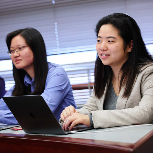 Questrom students in class