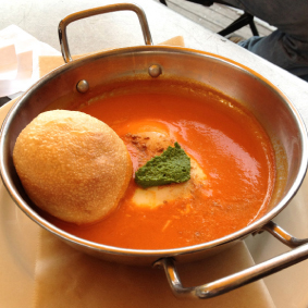 Shakshuka, a Middle Eastern dish of eggs poached in a spicy tomato sauce served with housemade pita bread (Sofra Bakery and Cafe in Cambridge)