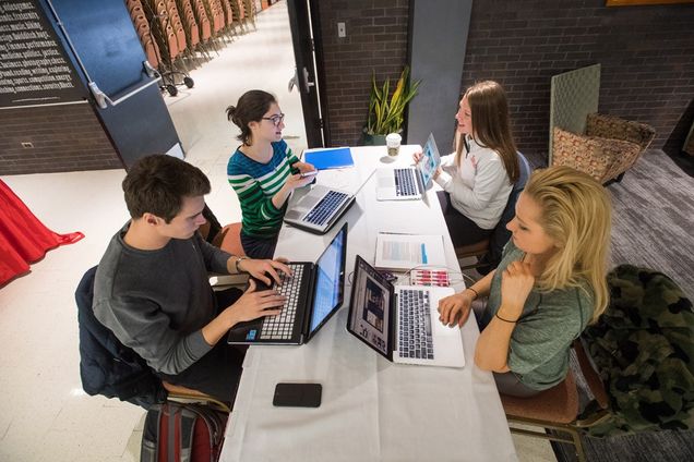 Members of the Shed’s Barbecue student team holding a working session in a quiet corner of the GSU: James Marinier (from left), Maite Erana Salmeron, Kelly Mathews, and Amy Dugan. Photo by Cydney Scott