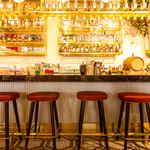 Empty barstools at a restaurant bar