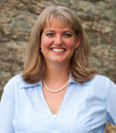 Profile image of Suzanne Markham Bagnera in a blue blouse