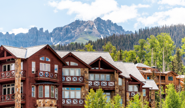 Telluride, Colorado small town Mountain Village in summer 2019 with view of San Juan Mountains and modern resort lodge apartment condo architecture