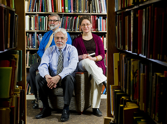 Librarians Jack Ammerman (from left), Robert Hudson, and Vika Zafrin say the new opt-out open access policy will benefit researchers, BU, and the public good. Photo by Cydney Scott