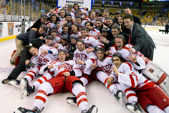 The Terriers with this year’s Lamoriello Trophy after beating UMass Lowell 5-3 on March 21 for their eighth Hockey East Tournament championship. Photos by Rich Gagnon/BU Athletics