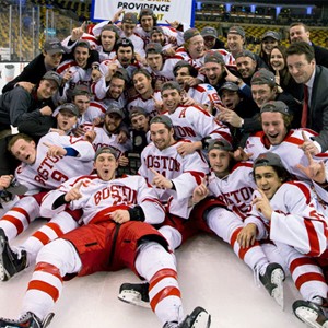 The Terriers with this year’s Lamoriello Trophy after beating UMass Lowell 5-3 on March 21 for their eighth Hockey East Tournament championship. Photos by Rich Gagnon/BU Athletics