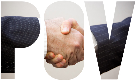 businessmen shaking hands agreeing to a partnership