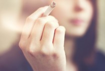 Girl with cigarette in hand