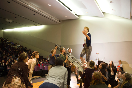 Chloe Fuller (CFA’13) (on ladder) as King Henry V and fellow cast members perform Shakespeare’s Henry V for an organizational behavior class of Jack McCarthy, a Questrom associate professor. Photo by Kalman Zabarsky