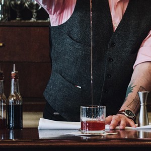 bartender pouring a drink