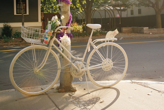 Ghost bike with flowers