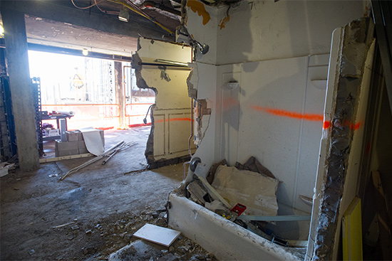 Bobcat bulldozers will soon be taking down the remnants of this old suite in Myles Standish Hall.