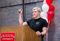 Edward Damiano holds the iLet bionic pancreas while accepting the Innovator of the Year award at the Boston University Tech, Drugs, and Rock n' Roll event