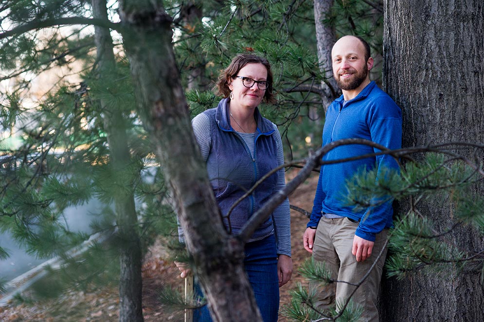 Photo of Lucy Hutyra and Andrew Reinmann in the forest