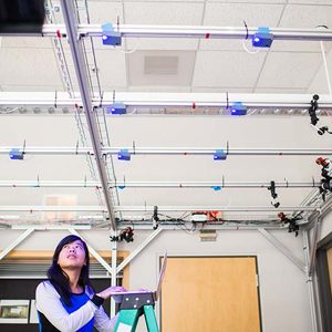 PhD candidate Emily Lam works with smart lighting sensors as part of Thomas Little's research with the Lighting Enabled Systems & Applications Engineering Research Center (LESA ERC)