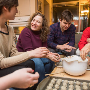 Karen Jacobs making cookies with students