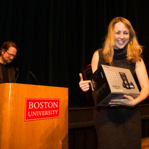 Emily Sheehan won the Redstone Film Festival award for best picture from festival faculty director Geoffrey Poister, a COM associate professor of film and television.