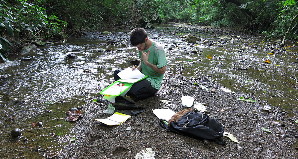 Jesse Delia during fieldwork on Rio Frijoles, Panama.