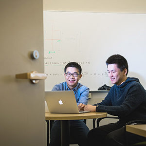 Dan Li (left), a BU professor of Earth and the Environment, and Yaofeng Gu (CAS'17)