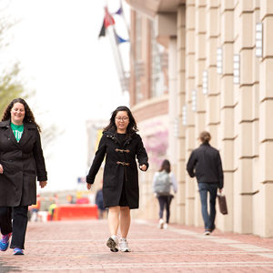 During lunchtime, and Marketing & Communications copy editor Rachel Johnson (left) and External Affairs administrative manager Takyu Tang log steps during their lunch break.